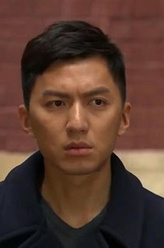 麦行直（袁伟豪饰演）