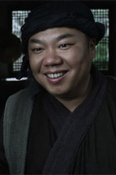 毛屠夫（姜超饰演）